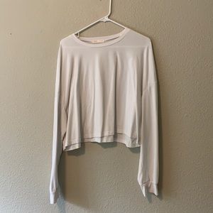 A long sleeve white crop top